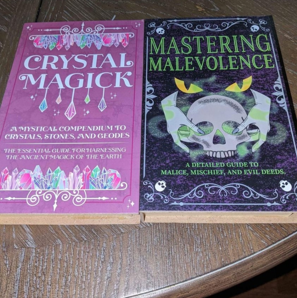Two Halloween Decorations Faux Books For Display.